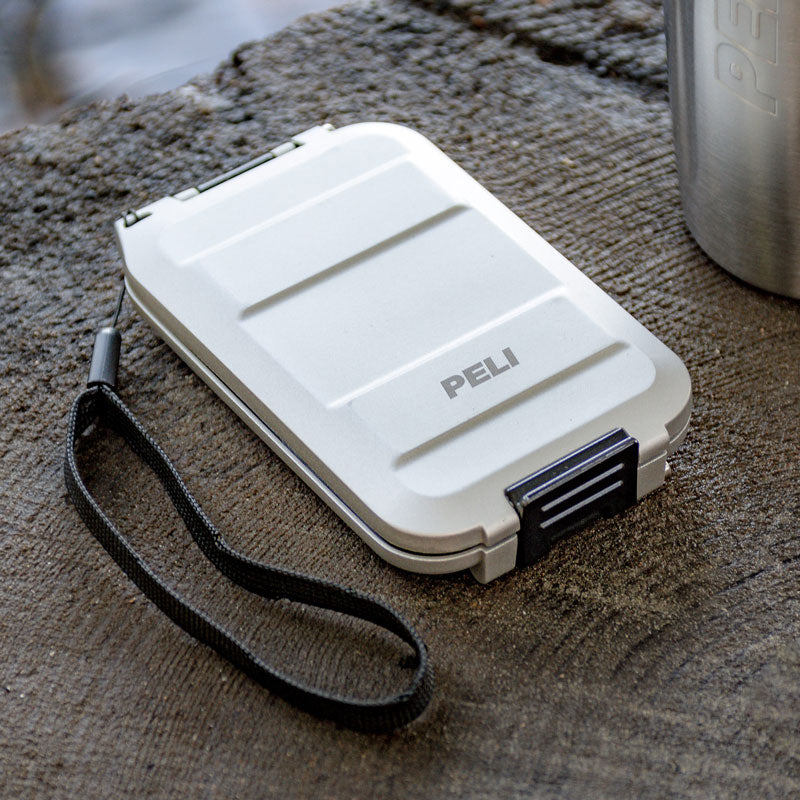 Peli G5 waterproof wallet in silver with wrist strap