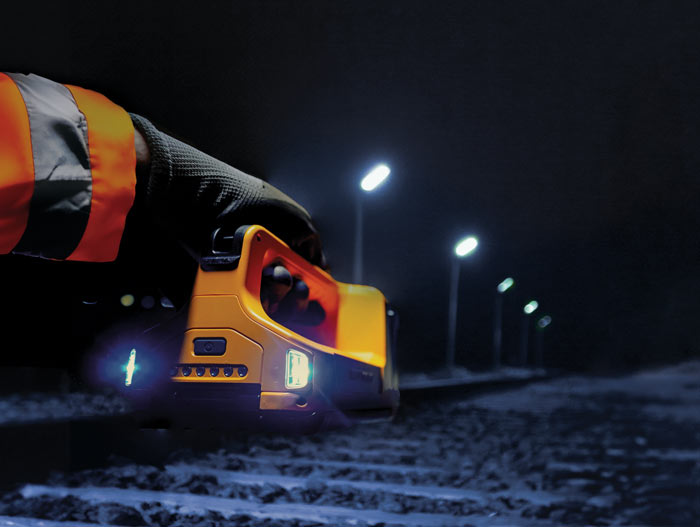 A Peli 9050 utility light being used to light up a railway track.