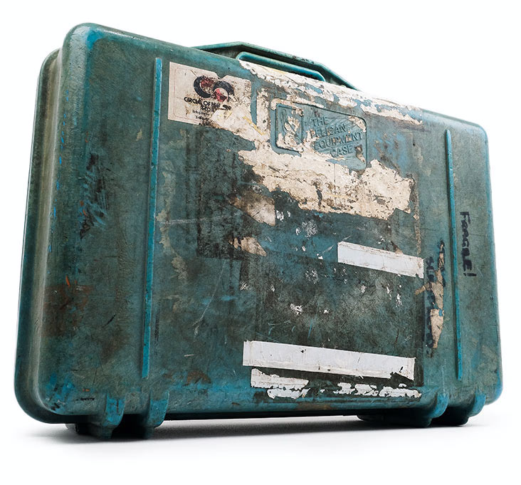 A very old, blue, "Pelican Equipment Case", manufactured in the 1980s.